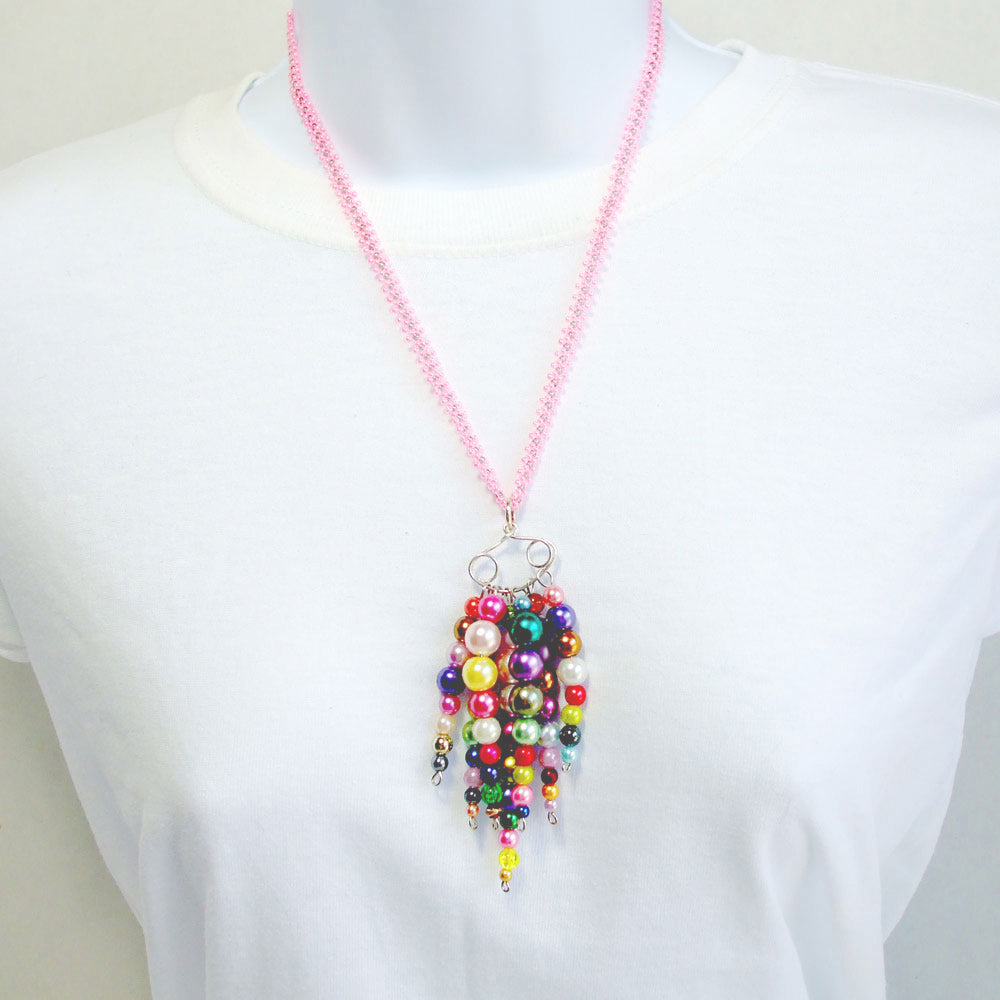 7506 *Multi color & sizes of pearl beads on Seven bead dangles of sterling silver wire.