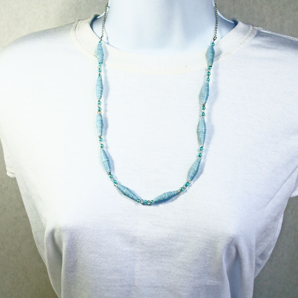 0287 *A single strand blue paper bead necklace, with blue pearl accent beads.