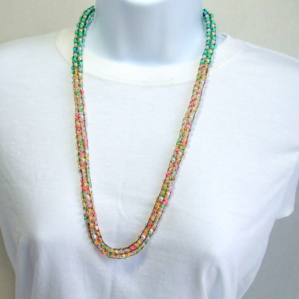 7510 *Turquoise and multi colored 4mm crystal beads, woven in a Viking Knit design. 