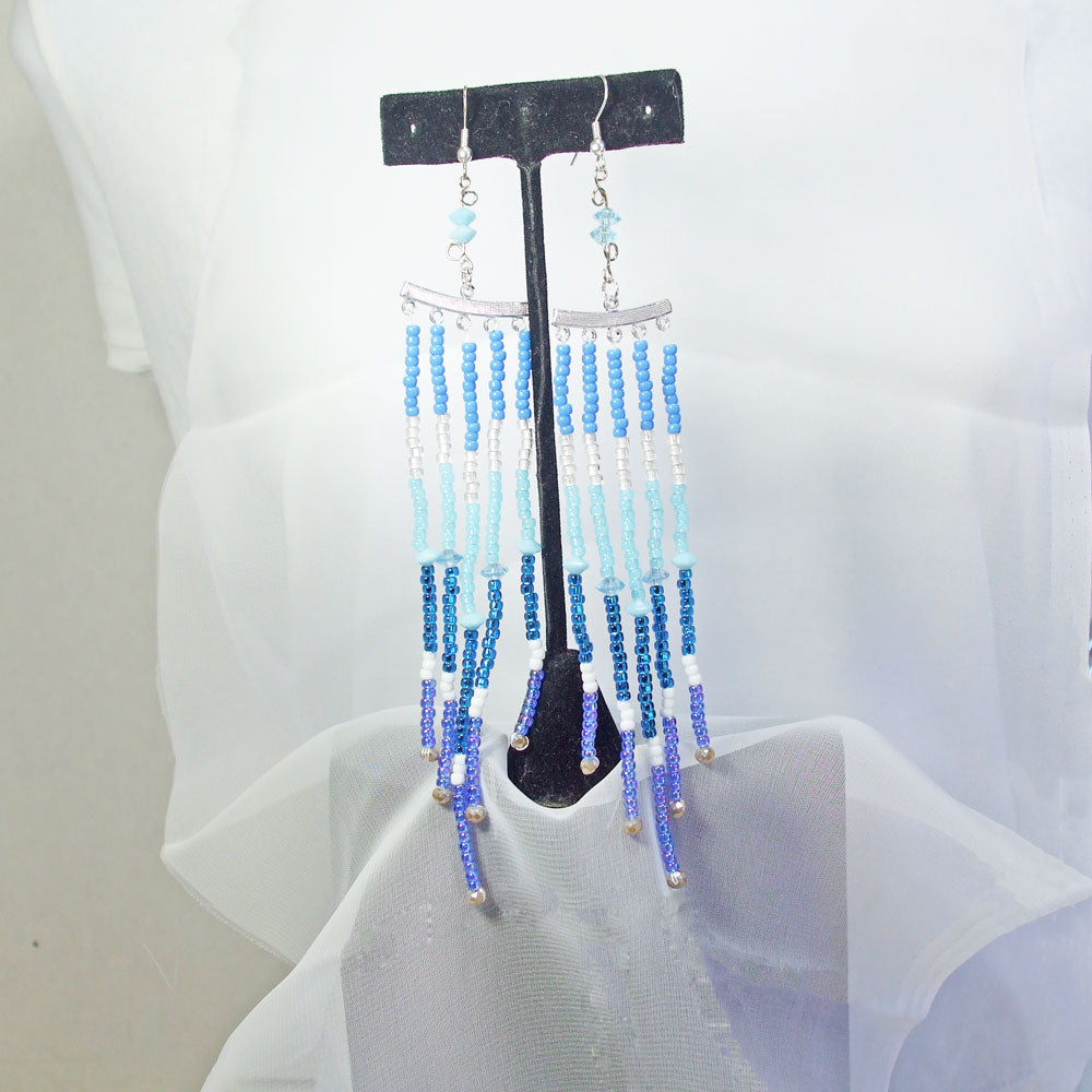 8034  *Very long, fringe dangle in five shades of blue with white. *Crystal beads accent.  Silver hanger with chain connection.